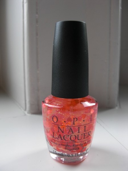 OPI`s glitter nail polish with little hearts would match the look perfectly "Heart to Resist"