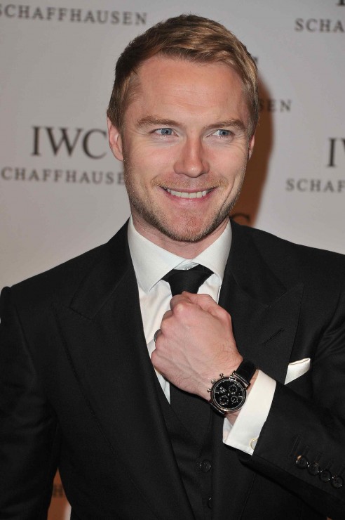 Ronan Keating demonstrates what this night is about: The launch of the new IWC Portofino watch family.