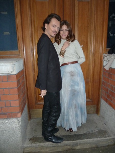 Matthew Williamson smoking a cigarette with Olivia Palermo before the show.