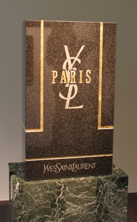 Untitled (YSL), Black granite tombstone and gold leaf, 2010