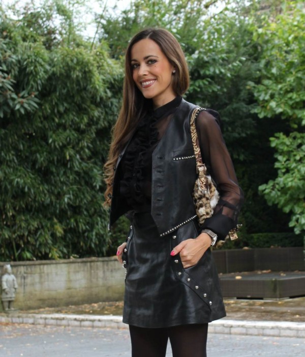 Sandra Bauknecht in Leo Biker Vest and studded leather skirt by Saint Laurent