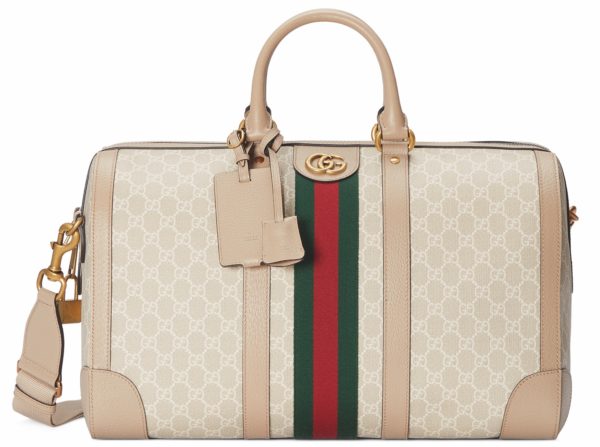 Gucci - Continuing its 100-year legacy in luggage, the House presents a  selection of Ophidia travel bags defined by a blue rendering of the GG  monogram and Web motif. In a special